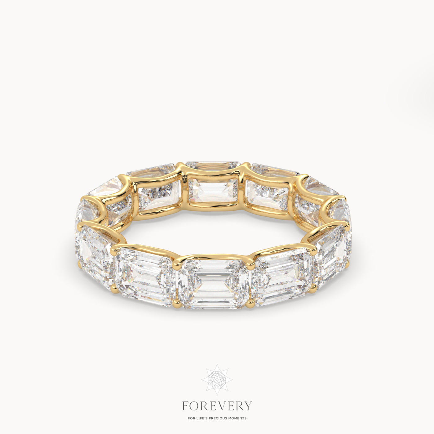 18k yellow gold  emerald eternity ring with horizontal diamonds