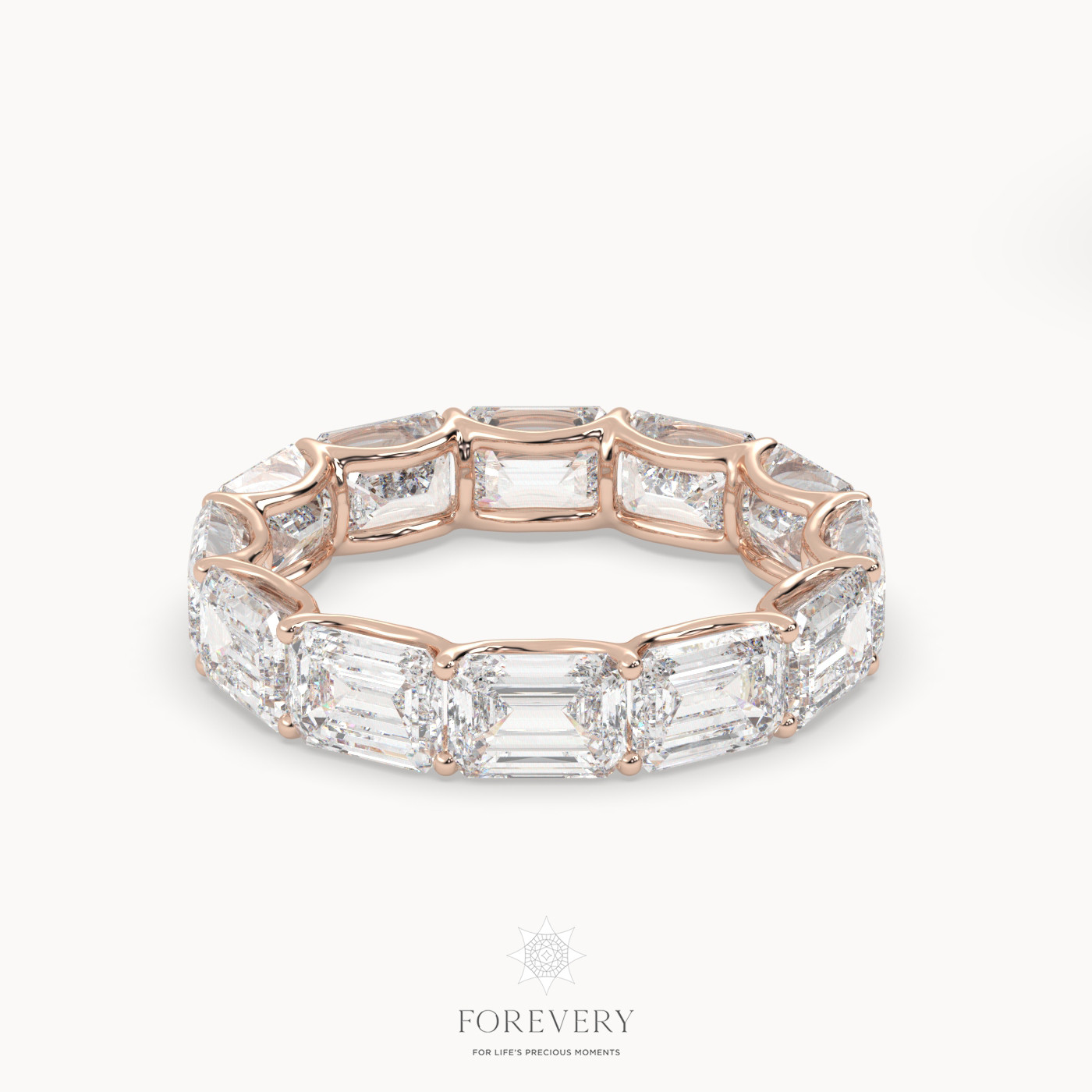 18k rose gold  emerald eternity ring with horizontal diamonds