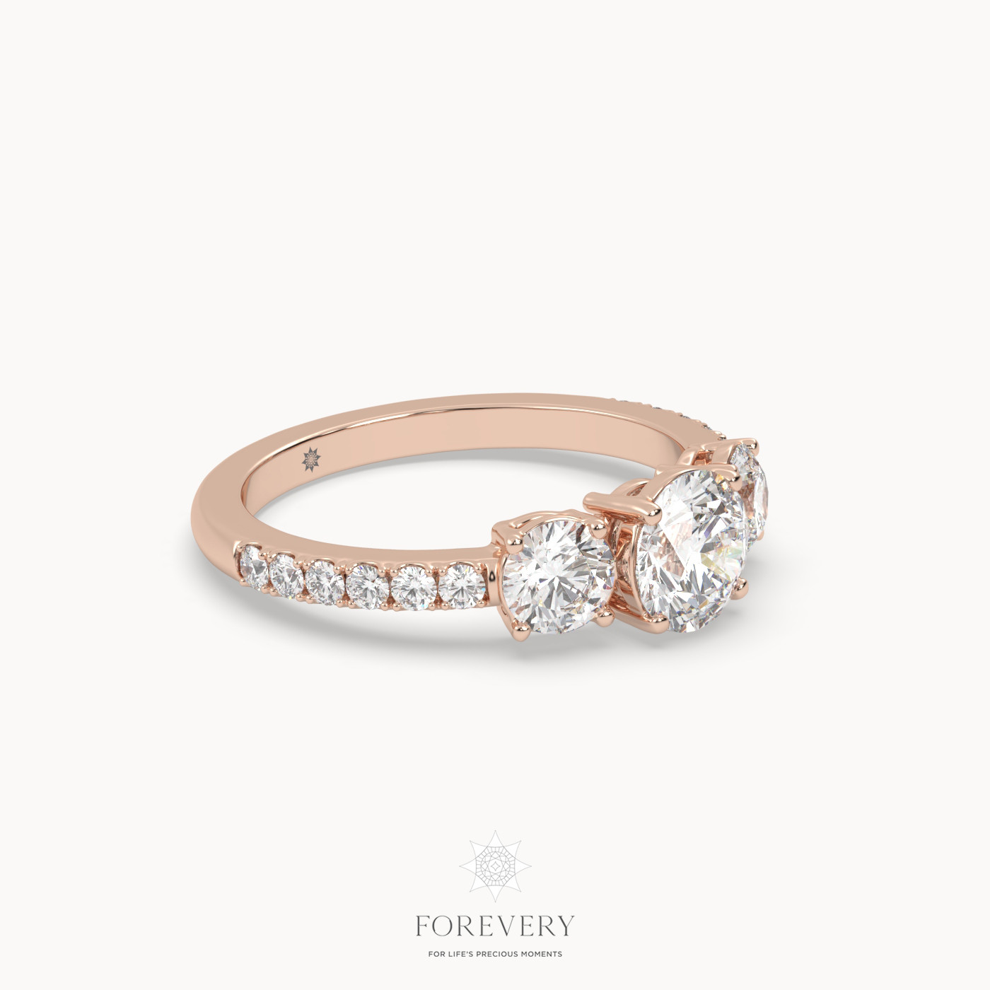 18k rose gold  three stone engagement ring