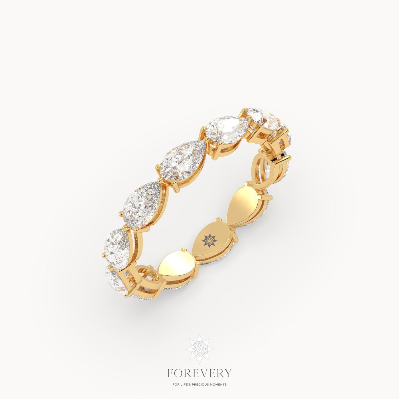 18k yellow gold  pear shape prong set diamond eternity ring