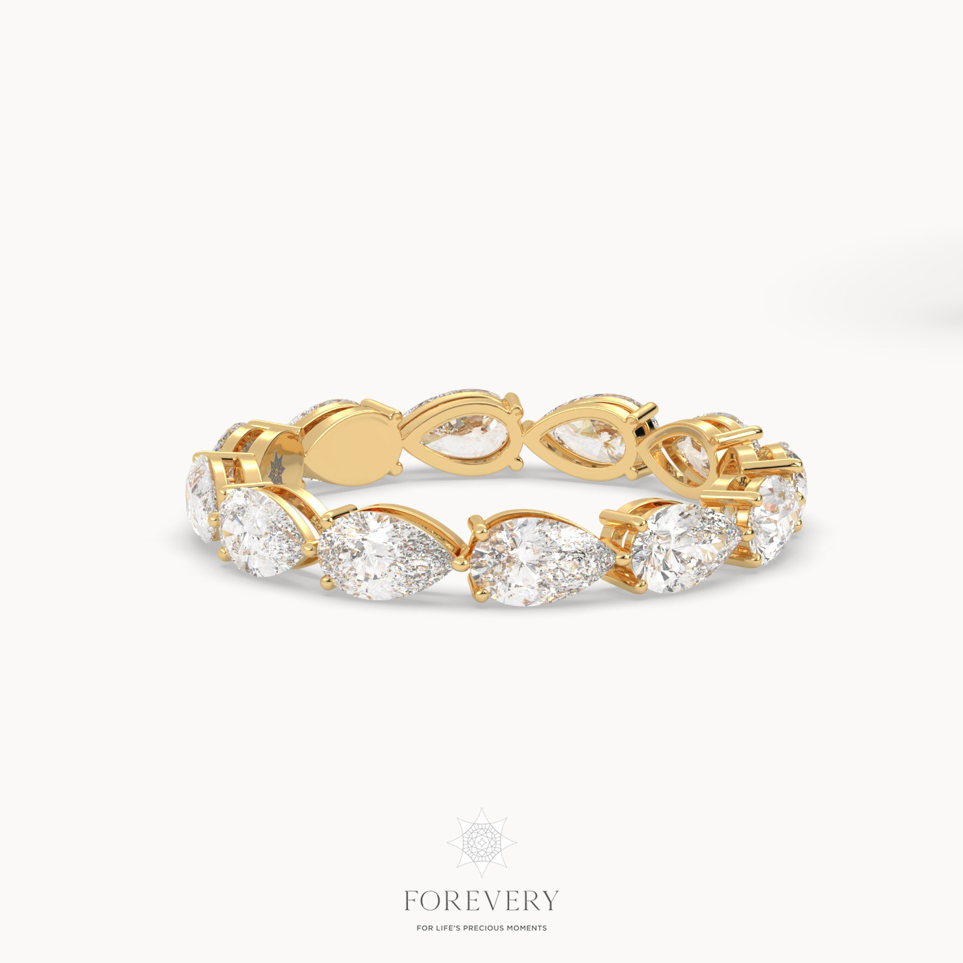 18k yellow gold  pear shape prong set diamond eternity ring